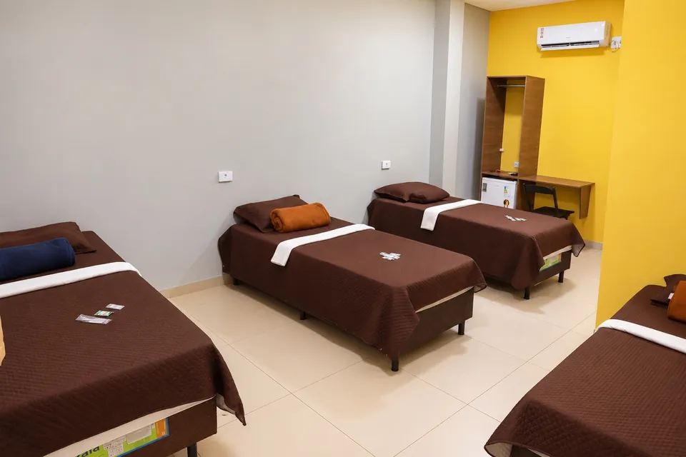Apartamento quádruplo, com camas de solteiro