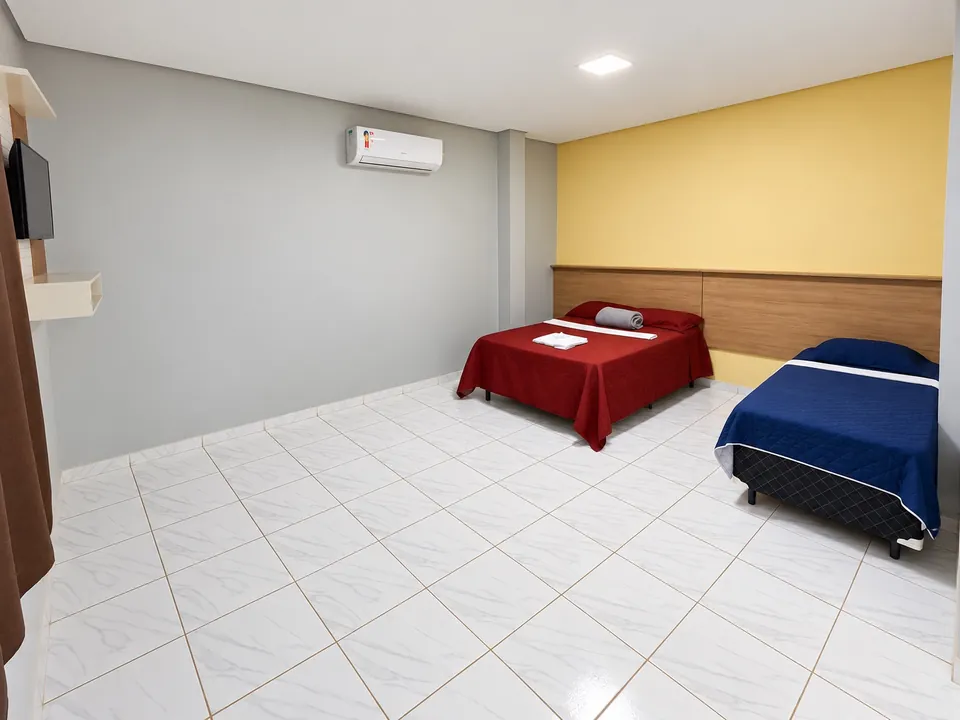 Apartamento casal + solteiro, com uma cama de casal e uma de solteiro